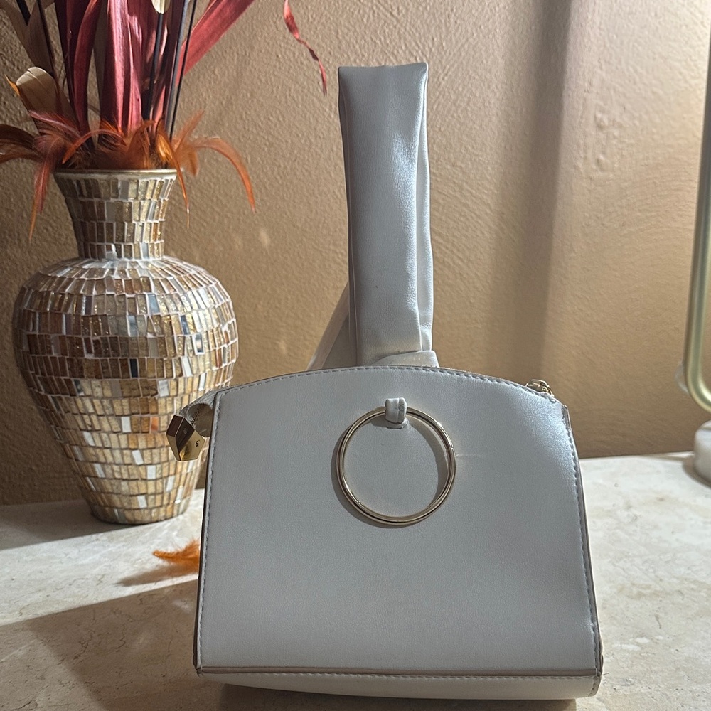 Elegant White Handbag with Ring Detail